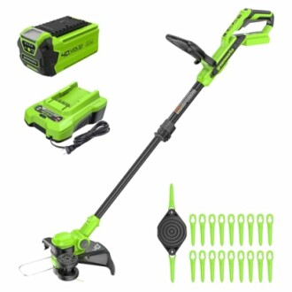 Green cordless string trimmer with battery, charger, and accessories.