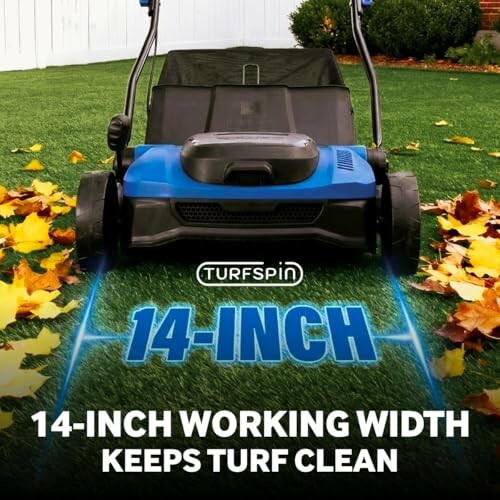 Lawn mower with 14-inch working width on grass with autumn leaves.